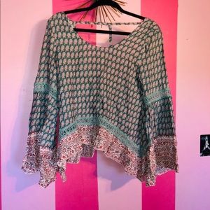 Patterned Top With Cute Detail!